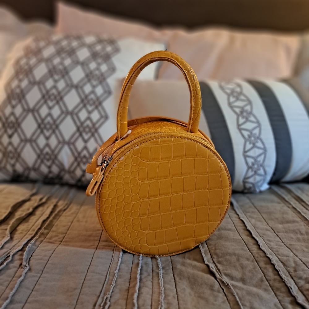 Mustard circle crossbody handbag